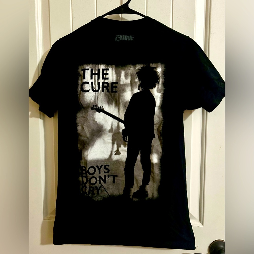 The Cure T-shirt for fans and concert goers. “Boys Don’t Cry” logo, Unisex